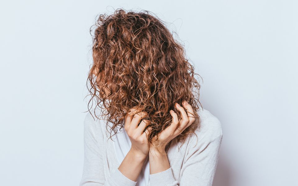 How To Manage Split Ends On Curly Hair